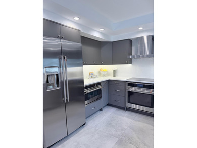 Stunning fully remodeled second-floor corner Bobby Jones on Gleneagles Golf and Country Club in Florida - for sale on GolfHomes.com, golf home, golf lot