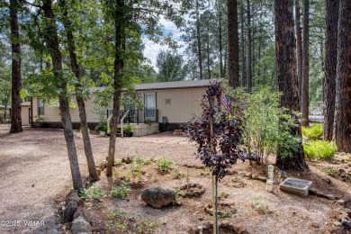 Located in Pinetop Lakes Mobile Homes. Single wide w/shed out on Pinetop Lakes Golf and Country Club in Arizona - for sale on GolfHomes.com, golf home, golf lot