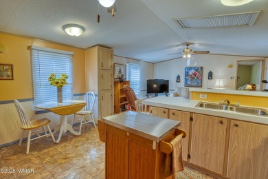 Located in Pinetop Lakes Mobile Homes. Single wide w/shed out on Pinetop Lakes Golf and Country Club in Arizona - for sale on GolfHomes.com, golf home, golf lot