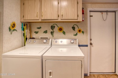 Located in Pinetop Lakes Mobile Homes. Single wide w/shed out on Pinetop Lakes Golf and Country Club in Arizona - for sale on GolfHomes.com, golf home, golf lot