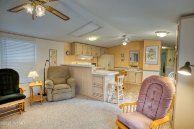 Located in Pinetop Lakes Mobile Homes. Single wide w/shed out on Pinetop Lakes Golf and Country Club in Arizona - for sale on GolfHomes.com, golf home, golf lot