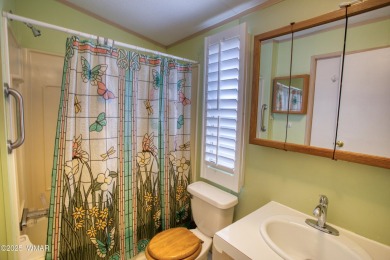 Located in Pinetop Lakes Mobile Homes. Single wide w/shed out on Pinetop Lakes Golf and Country Club in Arizona - for sale on GolfHomes.com, golf home, golf lot