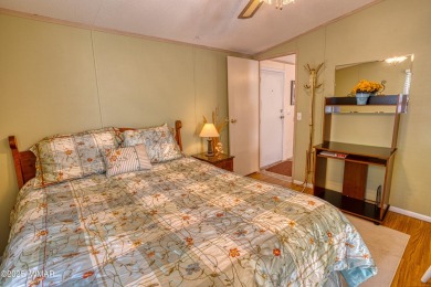 Located in Pinetop Lakes Mobile Homes. Single wide w/shed out on Pinetop Lakes Golf and Country Club in Arizona - for sale on GolfHomes.com, golf home, golf lot