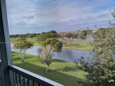 EXTRAORDINARLY BEAUTIFUL VIEW TO CANAL AND LAKE!  Completely on Flamingo Lakes Country Club in Florida - for sale on GolfHomes.com, golf home, golf lot