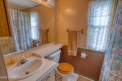 Located in Pinetop Lakes Mobile Homes. Single wide w/shed out on Pinetop Lakes Golf and Country Club in Arizona - for sale on GolfHomes.com, golf home, golf lot