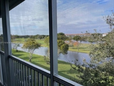 EXTRAORDINARLY BEAUTIFUL VIEW TO CANAL AND LAKE!  Completely on Flamingo Lakes Country Club in Florida - for sale on GolfHomes.com, golf home, golf lot