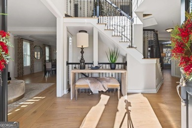 Welcome home to timeless style perfectly positioned on a private on Woodmont Golf and Country Club in Georgia - for sale on GolfHomes.com, golf home, golf lot