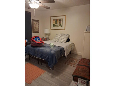 Welcome to this well maintained and inviting second floor condo on Sunrise Lakes Phase IV Golf Course in Florida - for sale on GolfHomes.com, golf home, golf lot