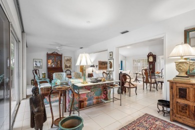 Sparkling lake views! Nestled in the Sanderling area of Quail on Quail Ridge Golf Course and Country Club in Florida - for sale on GolfHomes.com, golf home, golf lot
