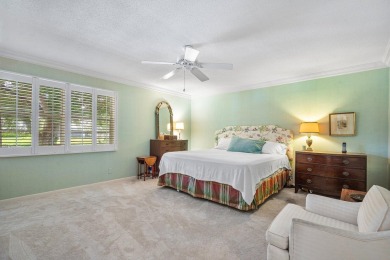 Sparkling lake views! Nestled in the Sanderling area of Quail on Quail Ridge Golf Course and Country Club in Florida - for sale on GolfHomes.com, golf home, golf lot