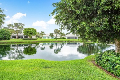 Sparkling lake views! Nestled in the Sanderling area of Quail on Quail Ridge Golf Course and Country Club in Florida - for sale on GolfHomes.com, golf home, golf lot