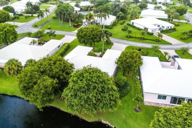 Sparkling lake views! Nestled in the Sanderling area of Quail on Quail Ridge Golf Course and Country Club in Florida - for sale on GolfHomes.com, golf home, golf lot