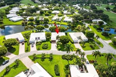 Sparkling lake views! Nestled in the Sanderling area of Quail on Quail Ridge Golf Course and Country Club in Florida - for sale on GolfHomes.com, golf home, golf lot