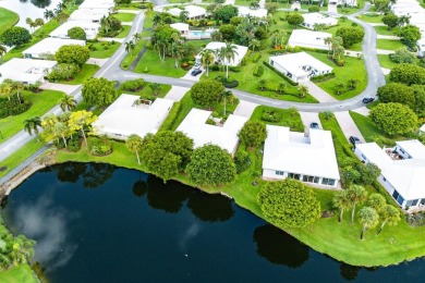 Sparkling lake views! Nestled in the Sanderling area of Quail on Quail Ridge Golf Course and Country Club in Florida - for sale on GolfHomes.com, golf home, golf lot
