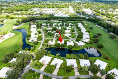 Sparkling lake views! Nestled in the Sanderling area of Quail on Quail Ridge Golf Course and Country Club in Florida - for sale on GolfHomes.com, golf home, golf lot