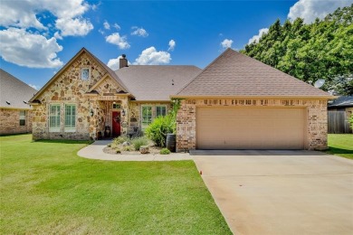 Charming, stone and brick 3 bed, 3 bath home with NO HOA just on Harbor Lakes Golf Club in Texas - for sale on GolfHomes.com, golf home, golf lot