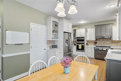 Welcome home to this beautifully maintained 4-bedroom, 2.5-bath on Cobbs Glen Country Club in South Carolina - for sale on GolfHomes.com, golf home, golf lot