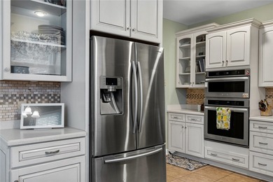 Welcome home to this beautifully maintained 4-bedroom, 2.5-bath on Cobbs Glen Country Club in South Carolina - for sale on GolfHomes.com, golf home, golf lot