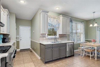 Welcome home to this beautifully maintained 4-bedroom, 2.5-bath on Cobbs Glen Country Club in South Carolina - for sale on GolfHomes.com, golf home, golf lot