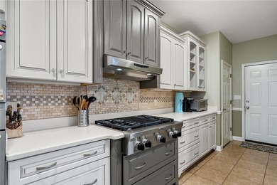 Welcome home to this beautifully maintained 4-bedroom, 2.5-bath on Cobbs Glen Country Club in South Carolina - for sale on GolfHomes.com, golf home, golf lot