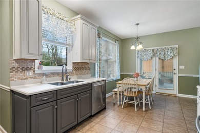 Welcome home to this beautifully maintained 4-bedroom, 2.5-bath on Cobbs Glen Country Club in South Carolina - for sale on GolfHomes.com, golf home, golf lot