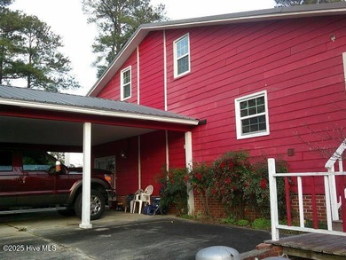 This is a great country house to accommodate a single family or on Land-O-Lakes Golf Course in North Carolina - for sale on GolfHomes.com, golf home, golf lot