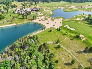 Embrace the pinnacle of golfing luxury with this extraordinary on Forest Dunes Golf Club in Michigan - for sale on GolfHomes.com, golf home, golf lot