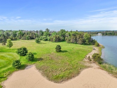 Embrace the pinnacle of golfing luxury with this extraordinary on Forest Dunes Golf Club in Michigan - for sale on GolfHomes.com, golf home, golf lot