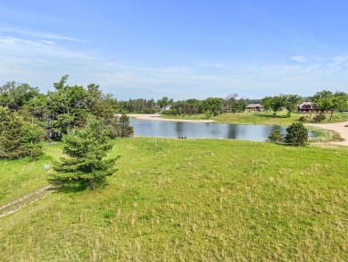 Embrace the pinnacle of golfing luxury with this extraordinary on Forest Dunes Golf Club in Michigan - for sale on GolfHomes.com, golf home, golf lot