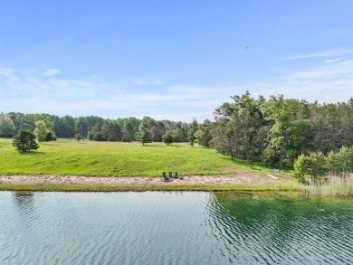 Embrace the pinnacle of golfing luxury with this extraordinary on Forest Dunes Golf Club in Michigan - for sale on GolfHomes.com, golf home, golf lot