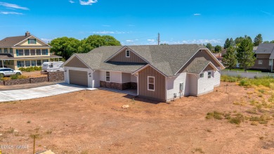 Welcome to this beautifully cared-for 4-bedroom, 2-bathroom home on Snowflake Municipal Golf Course in Arizona - for sale on GolfHomes.com, golf home, golf lot