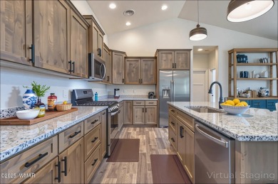 Welcome to this beautifully cared-for 4-bedroom, 2-bathroom home on Snowflake Municipal Golf Course in Arizona - for sale on GolfHomes.com, golf home, golf lot