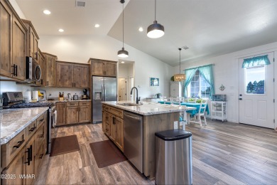 Welcome to this beautifully cared-for 4-bedroom, 2-bathroom home on Snowflake Municipal Golf Course in Arizona - for sale on GolfHomes.com, golf home, golf lot