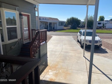 Great Location!  Enjoy the huge deck while watching the sunset on Juniper Ridge R.V. Golf Resort in Arizona - for sale on GolfHomes.com, golf home, golf lot