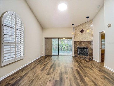 Palm Harbor - Nestled in the gated community of Wescott Square on Tarpon Woods Golf Club in Florida - for sale on GolfHomes.com, golf home, golf lot