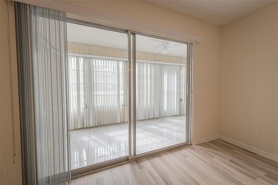 Nestled in the vibrant heart of Wynmoor, an adult community that on Wynmoor Golf Course in Florida - for sale on GolfHomes.com, golf home, golf lot