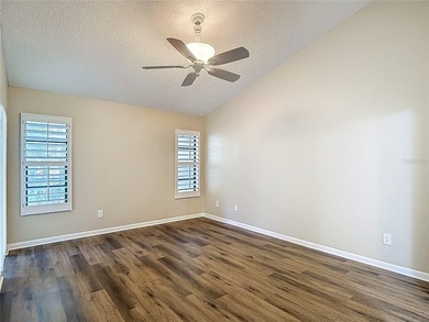 Palm Harbor - Nestled in the gated community of Wescott Square on Tarpon Woods Golf Club in Florida - for sale on GolfHomes.com, golf home, golf lot