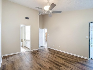 Palm Harbor - Nestled in the gated community of Wescott Square on Tarpon Woods Golf Club in Florida - for sale on GolfHomes.com, golf home, golf lot