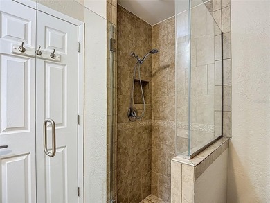 Palm Harbor - Nestled in the gated community of Wescott Square on Tarpon Woods Golf Club in Florida - for sale on GolfHomes.com, golf home, golf lot