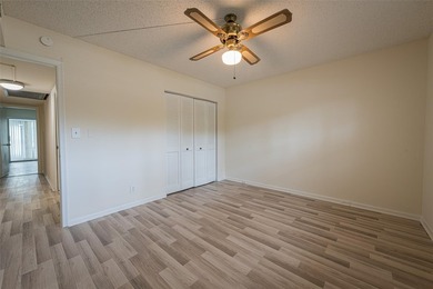 Nestled in the vibrant heart of Wynmoor, an adult community that on Wynmoor Golf Course in Florida - for sale on GolfHomes.com, golf home, golf lot