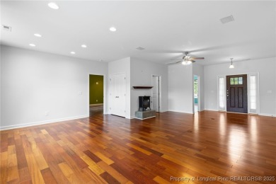 Custom-built golf course home in the highly sought-after, gated on Carolina Trace Country Club in North Carolina - for sale on GolfHomes.com, golf home, golf lot