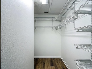 Palm Harbor - Nestled in the gated community of Wescott Square on Tarpon Woods Golf Club in Florida - for sale on GolfHomes.com, golf home, golf lot