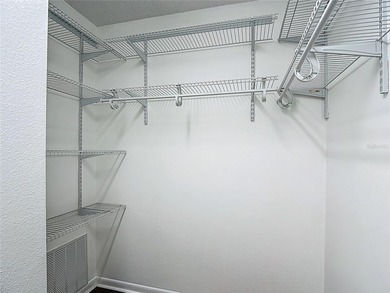 Palm Harbor - Nestled in the gated community of Wescott Square on Tarpon Woods Golf Club in Florida - for sale on GolfHomes.com, golf home, golf lot