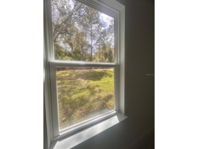 ***Seller contribution $1,000 for Wash & Dryer****This Model on Citrus Springs Country Club in Florida - for sale on GolfHomes.com, golf home, golf lot