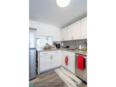 Discover the perfect blend of comfort and convenience in this on Oriole Golf and Tennis Club in Florida - for sale on GolfHomes.com, golf home, golf lot