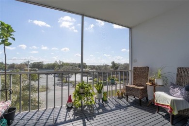 Discover the perfect blend of comfort and convenience in this on Oriole Golf and Tennis Club in Florida - for sale on GolfHomes.com, golf home, golf lot