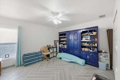 Tropical Paradise Living - No HOA!  ** THE FENCE IN THE BACK IS on Duffys Golf Center in Florida - for sale on GolfHomes.com, golf home, golf lot