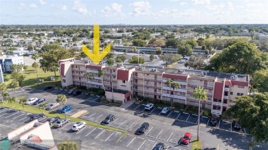 Discover the perfect blend of comfort and convenience in this on Oriole Golf and Tennis Club in Florida - for sale on GolfHomes.com, golf home, golf lot