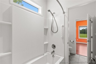Custom-built golf course home in the highly sought-after, gated on Carolina Trace Country Club in North Carolina - for sale on GolfHomes.com, golf home, golf lot