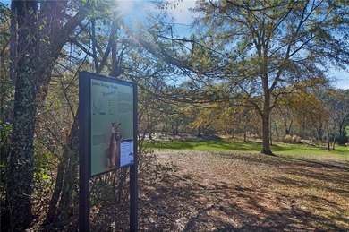 Step into this beautifully sun-filled home and experience the on Rivermont Golf and Country Club in Georgia - for sale on GolfHomes.com, golf home, golf lot
